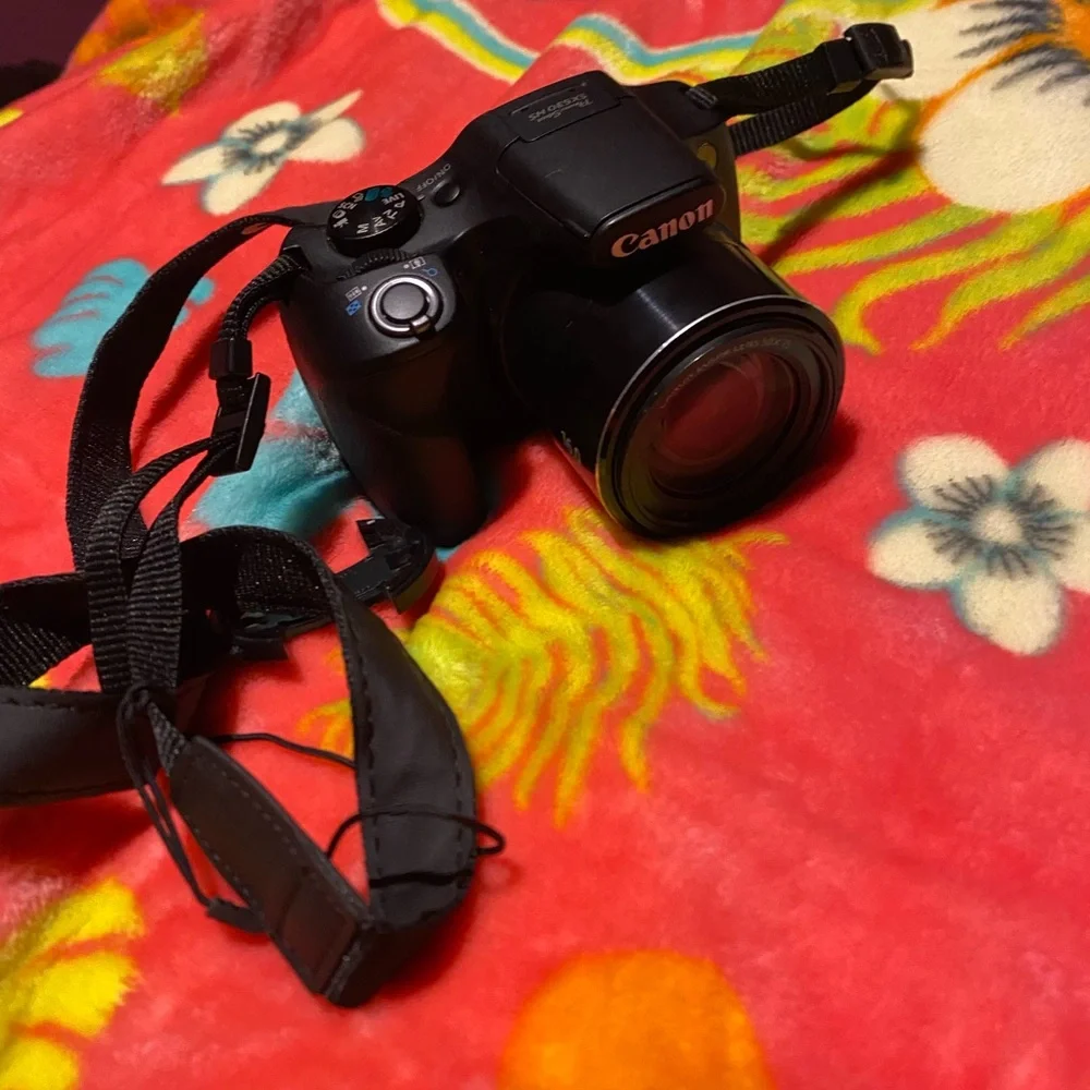Canon Black Digital Camera with Strap